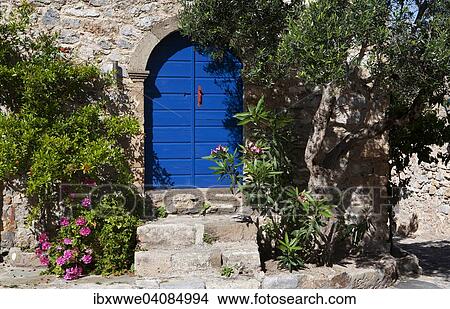 Blue front door, medieval fortified village, Monemvasia, Laconia, Peloponnese, Greece, Europe View Large Photo Image Picture - Blue front door, medieval fortified village, Monemvasia, Laconia, Peloponnese, Greece, Europe. Fotosearch