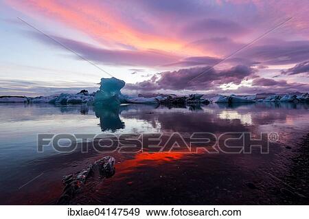 Blue iceberg in sunset, Jokulsarlon, Hornafjorour, Austurland, Iceland, Europe View Large Photo Image Stock Photo - Blue iceberg in sunset, Jokulsarlon, Hornafjorour, Austurland, Iceland, Europe. Fotosearch