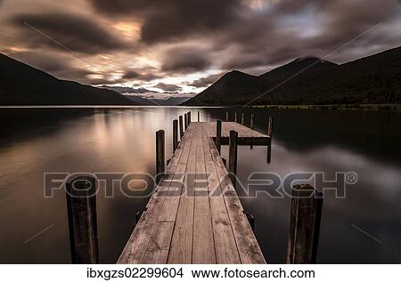 Picture - Boardwalk, dark weather mood, Lake Rotoroa, South Island, New Zealand, Oceania. Fotosearch