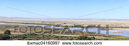 Border bridge over the Orange River between Namibia and South Africa, Oranjemund, Alexander Bay, Namibia, Africa View Large Photo Image Stock Photo - Border bridge over the Orange River between Namibia and South Africa, Oranjemund, Alexander Bay, Namibia, Africa. Fotosearch