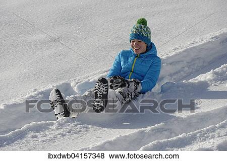 Stock Photo - Boy on a minibob in deep snow, Bad Heilbrunn, Upper Bavaria, Bavaria, Germany, Europe. Fotosearch