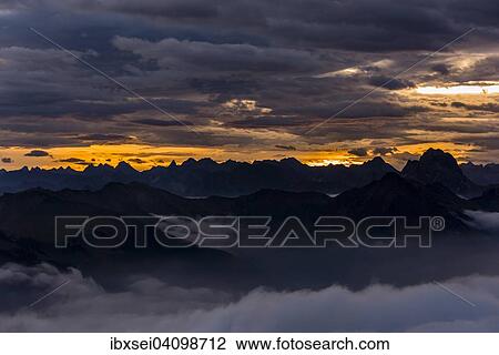 Bregenzerwald mountains with clouds below, morning, Au, Bregenz Forest, Vorarlberg, Austria, Europe View Large Photo Image Stock Image - Bregenzerwald mountains with clouds below, morning, Au, Bregenz Forest, Vorarlberg, Austria, Europe. Fotosearch