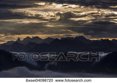 Stock Image - Bregenzerwald mountains with clouds below, morning, Au, Bregenz Forest, Vorarlberg, Austria, Europe. Fotosearch