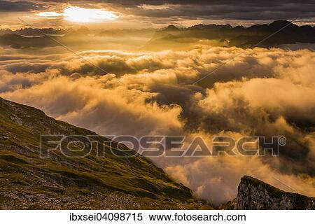 Bregenzerwald mountains with clouds below, sunrise, Au, Bregenz Forest, Vorarlberg, Austria, Europe View Large Photo Image Stock Photography - Bregenzerwald mountains with clouds below, sunrise, Au, Bregenz Forest, Vorarlberg, Austria, Europe. Fotosearch