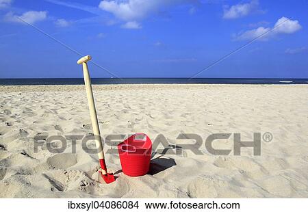 Bucket and spade on a beach, Julianadorp an Zee, North Holland, The Netherlands, Europe View Large Photo Image Picture - Bucket and spade on a beach, Julianadorp an Zee, North Holland, The Netherlands, Europe. Fotosearch