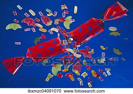 Bursting cracker with fruit gums View Large Photo Image Stock Image - Bursting cracker with fruit gums. Fotosearch