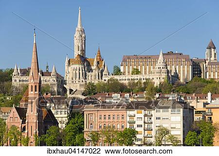 Stock Image - Calvinist Church, Matthias Church, Fishermen's Bastion and Hotel Hilton, Budapest, Hungary, Europe. Fotosearch