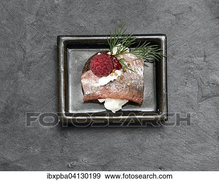 Stock Photo - Canape on a slate plate. Fotosearch