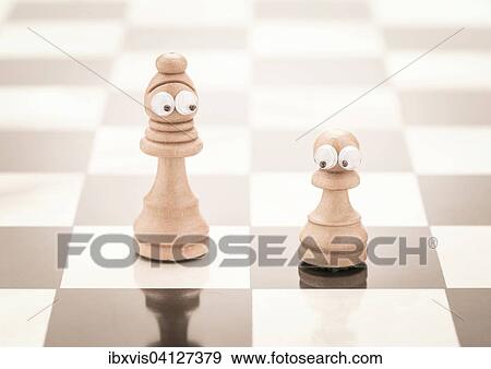 Chess pieces with eyes, a tall and a small one View Large Photo Image Stock Photo - Chess pieces with eyes, a tall and a small one. Fotosearch