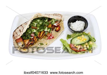 chicken gyros in pita with salad View Large Photo Image Stock Image - chicken gyros in pita with salad. Fotosearch