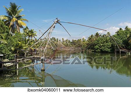 Stock Image - Chinese fishing nets, backwaters, near Kochi, Kerala, India, Asia. Fotosearch