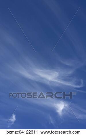 Cirrus clouds in the blue sky View Large Photo Image Stock Image - Cirrus clouds in the blue sky. Fotosearch
