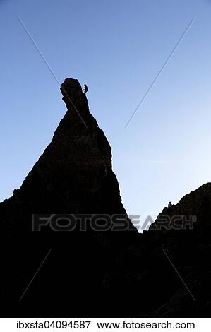 Climber on a cliff in the evening light at Savoy Alps, backlit, Chamonix, France, Europe View Large Photo Image Stock Photo - Climber on a cliff in the evening light at Savoy Alps, backlit, Chamonix, France, Europe. Fotosearch