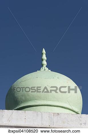 Stock Image - Close-up of Green Dome of Mosque against a deep blue sky, Pushkar, Rajasthan, India, Asia. Fotosearch