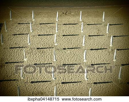 Closed parasols, empty beach, Gaeta, Italy, Europe View Large Photo Image Stock Photography - Closed parasols, empty beach, Gaeta, Italy, Europe. Fotosearch