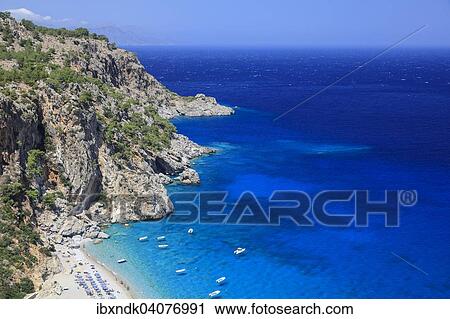 Stock Image - Coast and beach of Kyra Panagia, Karpathos, Dodecanese, South Aegean, Greece, Europe. Fotosearch