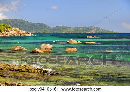 Coast with large rocks in the water, Praslin Island, Seychelles, Africa View Large Photo Image Stock Image - Coast with large rocks in the water, Praslin Island, Seychelles, Africa. Fotosearch