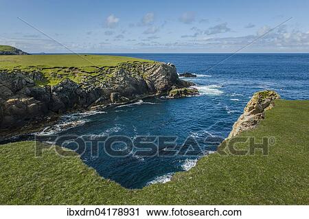 Stock Image - Coastline at the northernmost point of Great Britain, Unst, Shetland Islands, Scotland, United Kingdom, Europe. Fotosearch
