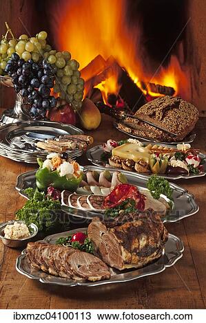 Cold Franconian buffet decorated on pewter in front of a burning fireplace, Middle Franconia, Bavaria, Germany, Europe View Large Photo Image Stock Image - Cold Franconian buffet decorated on pewter in front of a burning fireplace, Middle Franconia, Bavaria, Germany, Europe. Fotosearch