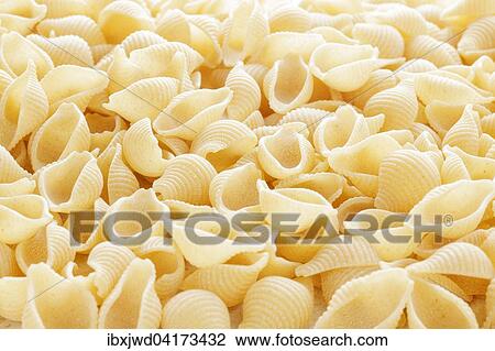 Stock Image - Conchigliette pasta shells. Fotosearch