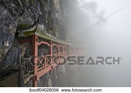 Covered hiking trail on a cliff in fog, Tianmen Mountain, Tianmen Mountain National Park, Yongding, Zhangjiajie, China, Asia View Large Photo Image Stock Photograph - Covered hiking trail on a cliff in fog, Tianmen Mountain, Tianmen Mountain National Park, Yongding, Zhangjiajie, China, Asia. Fotosearch