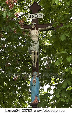 Crucifix with Virgin Mary amongst chestnut leaves, Upper Franconia, Bavaria, Germany, Europe View Large Photo Image Stock Image - Crucifix with Virgin Mary amongst chestnut leaves, Upper Franconia, Bavaria, Germany, Europe. Fotosearch