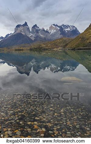 Stock Photo - Cuernos del Paine reflecting in Lago Pehoe, Torres del Paine National Park, Chilean Patagonia, Chile, South America. Fotosearch