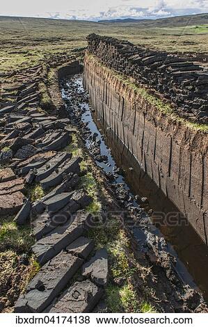Stock Photo - Cut peat on a peat bog, Yell, Shetland Islands, Scotland, United Kingdom, Europe. Fotosearch