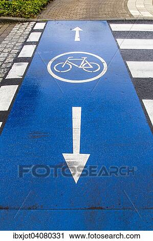 Cycle path marking on a pavement View Large Photo Image Stock Image - Cycle path marking on a pavement. Fotosearch