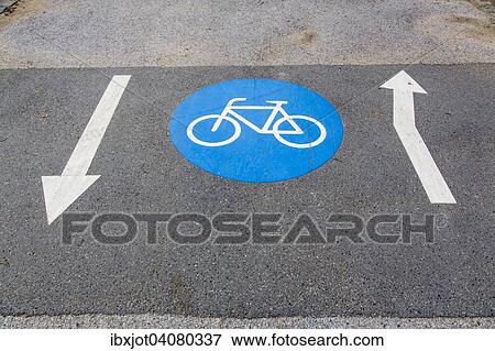 Cycle path marking on a pavement View Large Photo Image Stock Photo - Cycle path marking on a pavement. Fotosearch