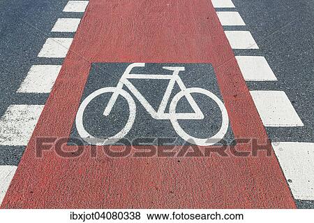 Cycle path marking on a pavement View Large Photo Image Stock Photo - Cycle path marking on a pavement. Fotosearch