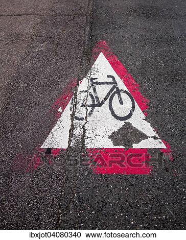 Cycle path marking on a pavement, worn away View Large Photo Image Stock Image - Cycle path marking on a pavement, worn away. Fotosearch