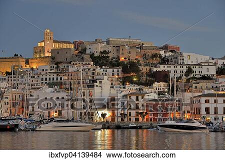 Picture - Dalt Vila of Ibiza or Eivissa, evening, Ibiza Town, Ibiza, Balearic Islands, Spain, Europe. Fotosearch