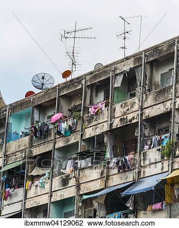 Deteriorated house facade with colorful laundry, Bangkok, Thailand, Asia View Large Photo Image Stock Image - Deteriorated house facade with colorful laundry, Bangkok, Thailand, Asia. Fotosearch