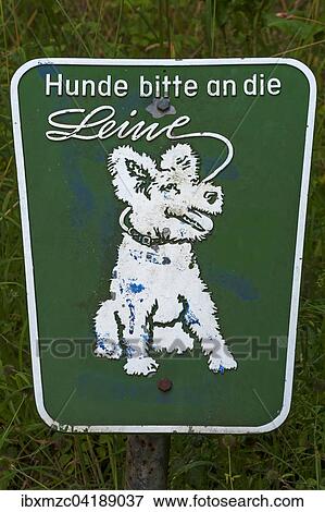 Stock Photo - Dogs must be on a leash, old sign in German, Schlosspark, Siegen, North Rhine-Westphalia, Germany, Europe. Fotosearch