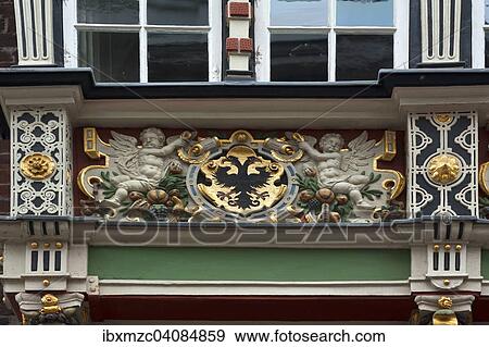 Double-headed eagle on the wooden balcony of the historic Town Hall, built in 1586, Lubeck, Schleswig-Holstein, Germany, Europe View Large Photo Image Stock Photo - Double-headed eagle on the wooden balcony of the historic Town Hall, built in 1586, Lubeck, Schleswig-Holstein, Germany, Europe. Fotosearch