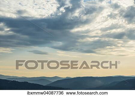 Dramatic clouds and silhouette of hills, twilight, Tuscany, Italy, Europe View Large Photo Image Stock Photograph - Dramatic clouds and silhouette of hills, twilight, Tuscany, Italy, Europe. Fotosearch