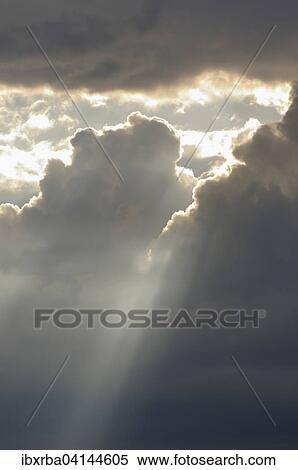 Dramatic cloudy sky with sun rays, Baden-Wurttemberg, Germany, Europe View Large Photo Image Stock Photography - Dramatic cloudy sky with sun rays, Baden-Wurttemberg, Germany, Europe. Fotosearch