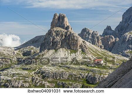 Stock Image - Dreizinnenhutte, in the back Sextnerstein and Toblinger Knoten, Sexten Dolomites, South Tyrol, Trentino-Alto Adige, Italy, Europe. Fotosearch