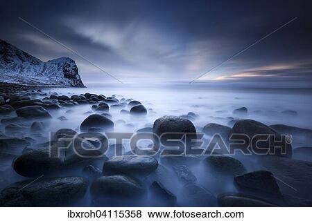 Stock Photo - Dusk on the beach of Unstad, Lofoten, Norway, Europe. Fotosearch