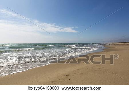 Empty sandy beach in Taranto, Apulia, Italy, Europe View Large Photo Image Stock Image - Empty sandy beach in Taranto, Apulia, Italy, Europe. Fotosearch