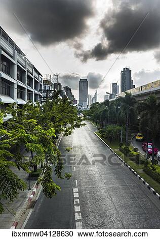 Empty street with skyscrapers behind, Bangkok, Thailand, Asia View Large Photo Image Stock Image - Empty street with skyscrapers behind, Bangkok, Thailand, Asia. Fotosearch