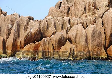 Stock Photo - Eroded rocks in the sea, Curieuse Island, near Praslin Island, Seychelles, Africa. Fotosearch