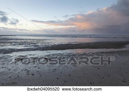 Evening atmosphere in the Lower Saxon Wadden Sea National Park, Neuharlingersiel, East Frisia, North Sea Coast, Lower Saxony, Germany, Europe View Large Photo Image Stock Image - Evening atmosphere in the Lower Saxon Wadden Sea National Park, Neuharlingersiel, East Frisia, North Sea Coast, Lower Saxony, Germany, Europe. Fotosearch