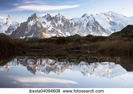 Evening light at Lac de Chesserys with mountains behind of Chamonix, Alps, France, Europe View Large Photo Image Stock Photo - Evening light at Lac de Chesserys with mountains behind of Chamonix, Alps, France, Europe. Fotosearch