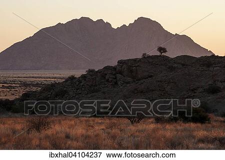 Evening light at Spitzkoppe, little Spitzkoppe behind, Namibia, Africa View Large Photo Image Stock Photo - Evening light at Spitzkoppe, little Spitzkoppe behind, Namibia, Africa. Fotosearch