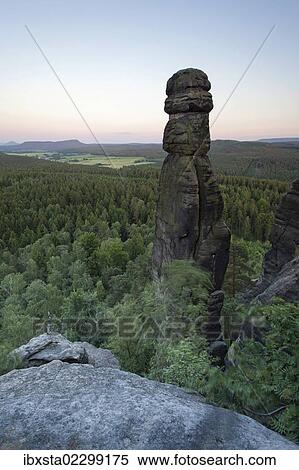 Evening mood from Pfaffenstein table mountain with the Barbarine rock formation in the Elbe Sandstone Mountains, Saxony, Germany, Europe View Large Photo Image Stock Photography - Evening mood from Pfaffenstein table mountain with the Barbarine rock formation in the Elbe Sandstone Mountains, Saxony, Germany, Europe. Fotosearch