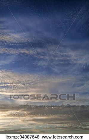 Evening sky with clouds, Altocumulus stratiformis clouds View Large Photo Image Stock Photo - Evening sky with clouds, Altocumulus stratiformis clouds. Fotosearch