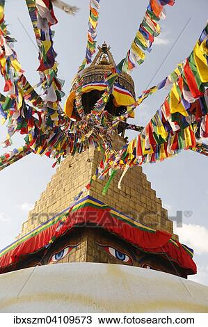 Eyes under the prayer flags, Boudhanath Stupa, Kathmandu, Nepal, Asia View Large Photo Image Stock Image - Eyes under the prayer flags, Boudhanath Stupa, Kathmandu, Nepal, Asia. Fotosearch