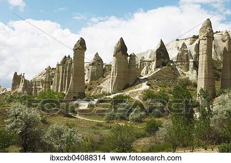 Fairy Chimneys, tufa formations in Love Valley, Goreme National Park, Nevsehir Province, Cappadocia, Anatolia, Turkey, Asia View Large Photo Image Picture - Fairy Chimneys, tufa formations in Love Valley, Goreme National Park, Nevsehir Province, Cappadocia, Anatolia, Turkey, Asia. Fotosearch
